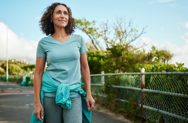 Smiling woman going for a walk