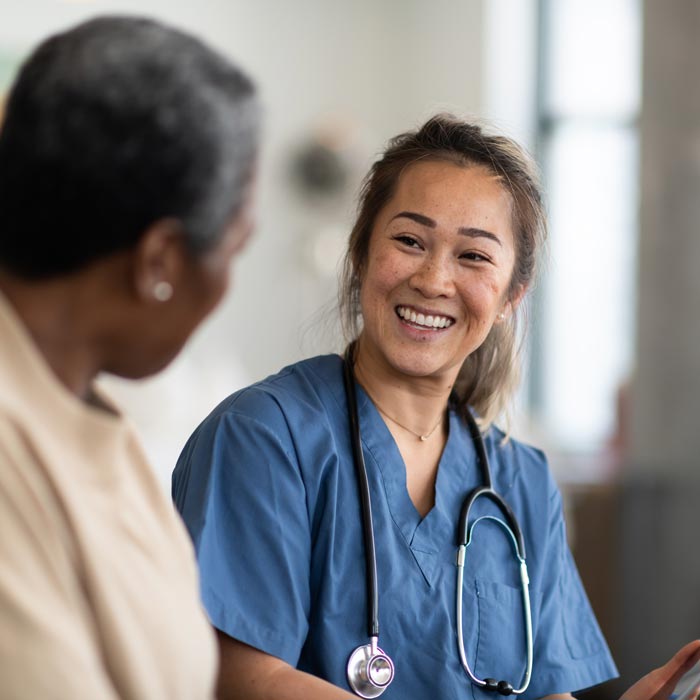 nurse talking to patient