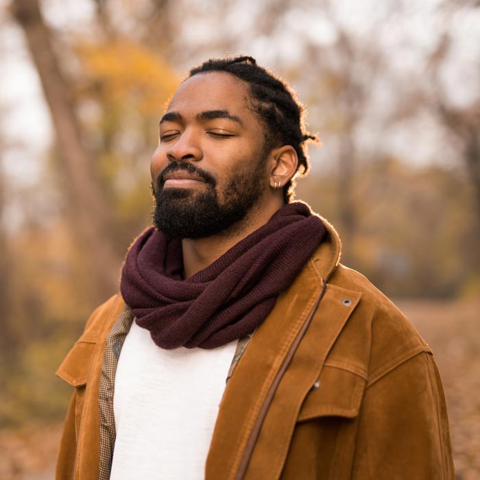 relaxed man in woods