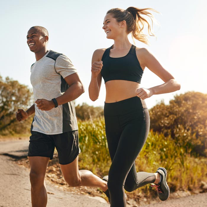 The boy and a girl going jogging with happy smile at Catonsville, MD 