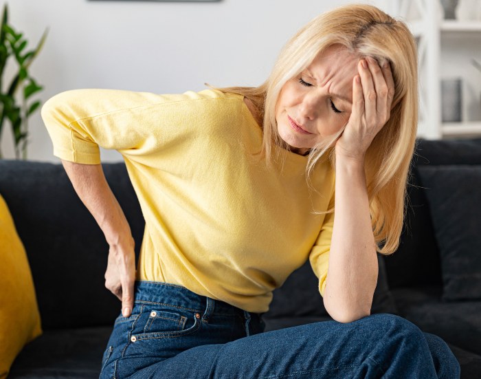 Woman facing sever back pain in Maryland